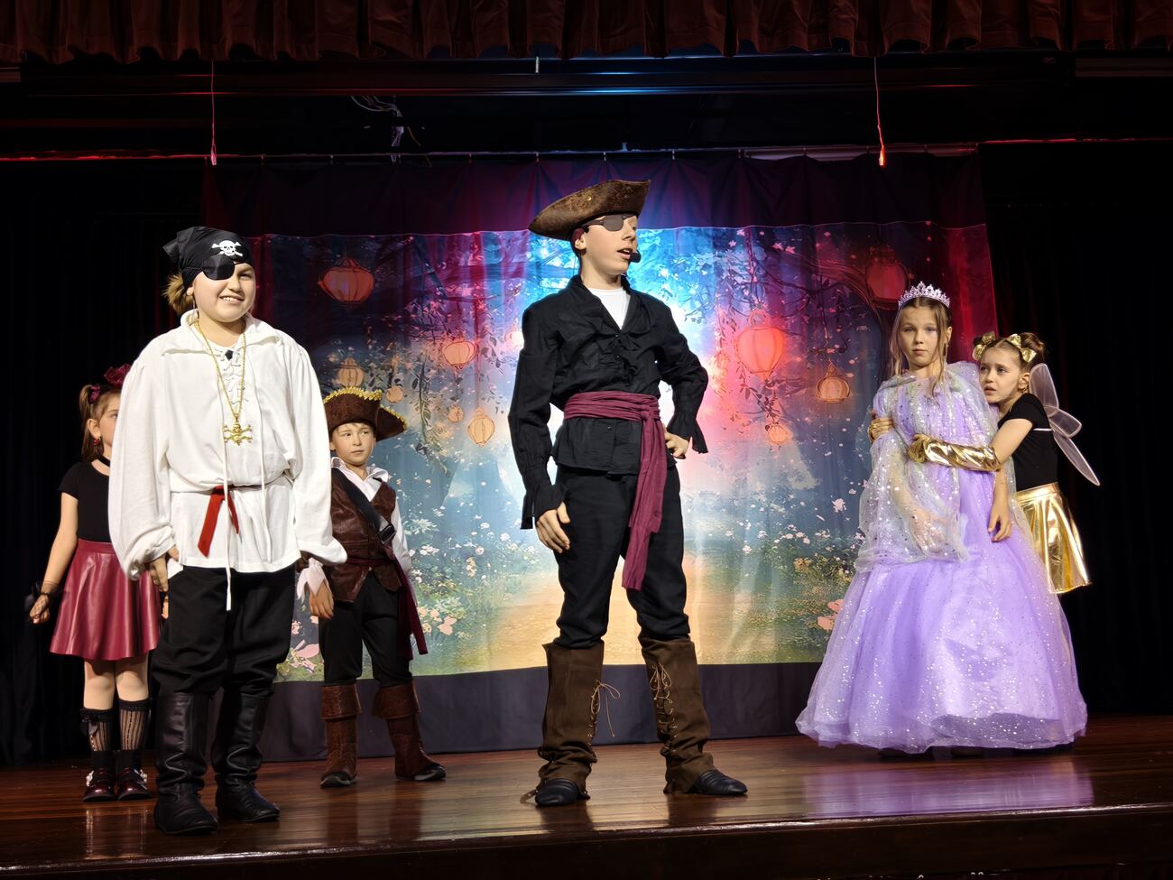 Students performing together on stage